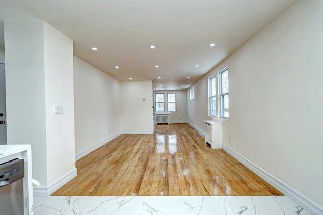 702 King St, Stratford, CT 06614 - unfurnished room featuring recessed lighting, light wood finished floors, radiator heating unit, and baseboards