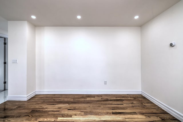 702 King St, Stratford, CT 06614 - empty room featuring wood finished floors, recessed lighting, and baseboards