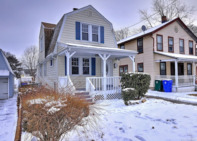 702 King St, Stratford, CT 06614 - colonial inspired home featuring covered porch and a gambrel roof
