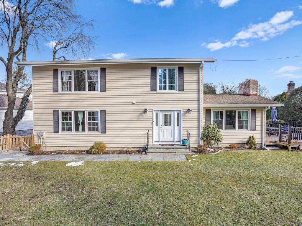 view of front of property with a front lawn