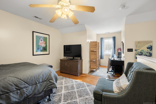 bedroom featuring light wood-type flooring and ceiling fan