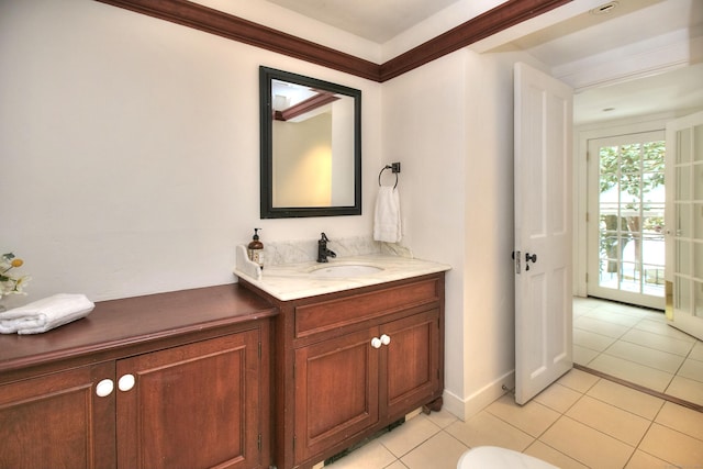 bathroom with tile patterned flooring and vanity