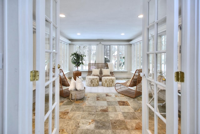 sunroom featuring french doors