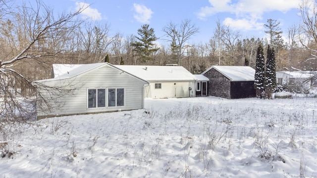 view of snow covered property