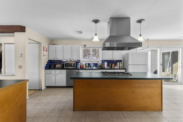 kitchen featuring white cabinetry, hanging light fixtures, appliances with stainless steel finishes, and island exhaust hood