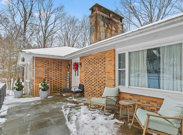 view of snow covered patio