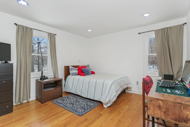 bedroom featuring hardwood / wood-style floors