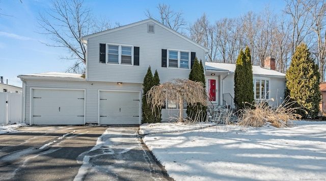 view of front of home with a garage