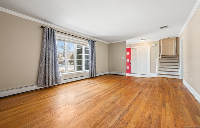 unfurnished living room featuring ornamental molding and light wood-type flooring