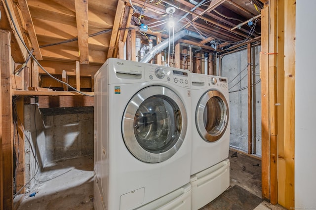 washroom featuring washer and dryer