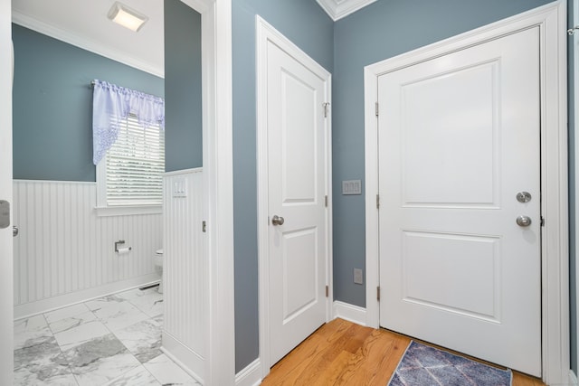 interior space with crown molding