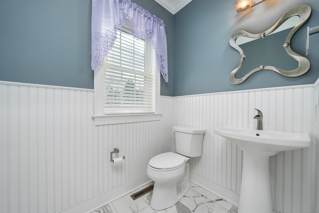 bathroom with toilet and sink