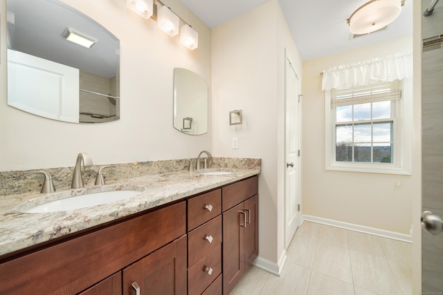 bathroom featuring vanity and tile patterned flooring