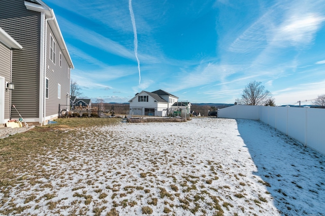 view of snow covered house