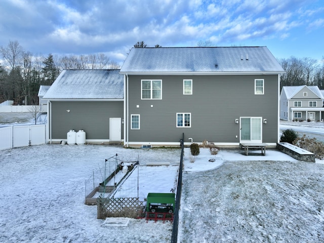 view of snow covered property