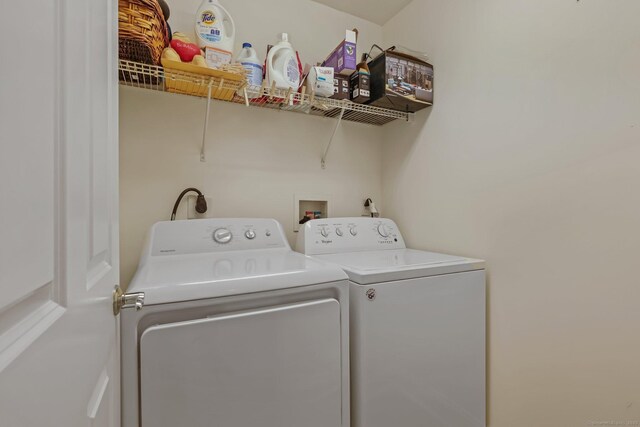 laundry area with laundry area and washer and dryer