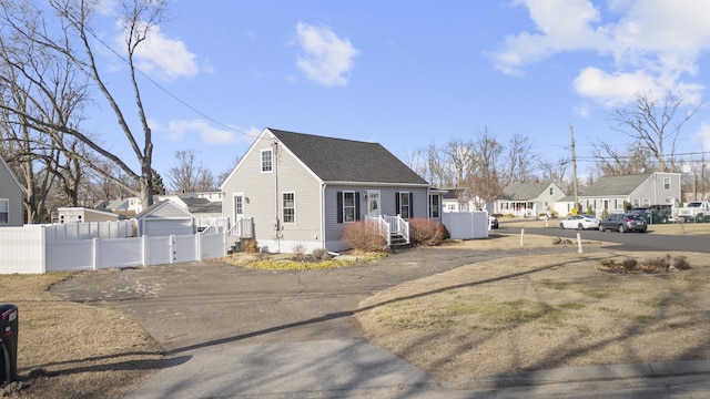 view of front of property with an outbuilding and a garage