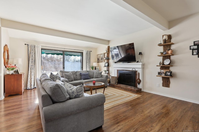 957A Heritage Vlg, Southbury, CT 06488 - living area with wood finished floors, a fireplace, baseboards, and beam ceiling