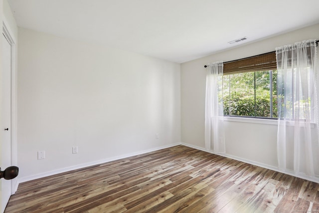 957A Heritage Vlg, Southbury, CT 06488 - unfurnished room with hardwood / wood-style floors and baseboards