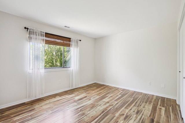 957A Heritage Vlg, Southbury, CT 06488 - spare room featuring wood finished floors and baseboards