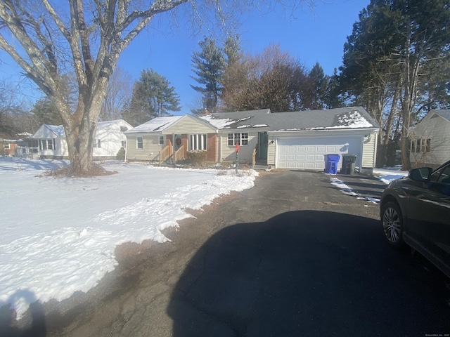 single story home with a garage