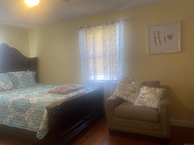 bedroom featuring dark wood-type flooring