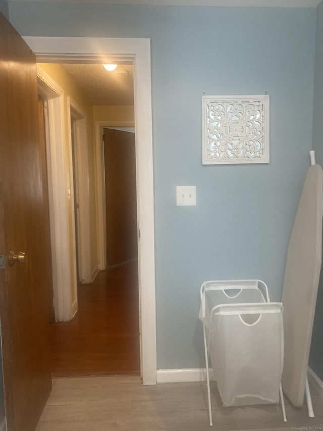 hall featuring light hardwood / wood-style floors