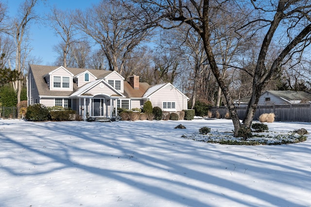 view of new england style home