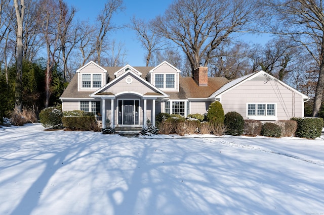 view of new england style home