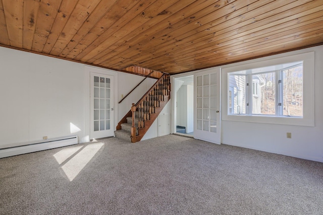 interior space with carpet floors, a baseboard heating unit, wood ceiling, and french doors