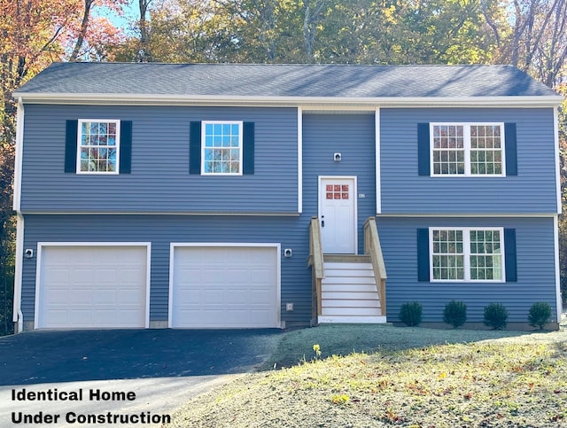 bi-level home featuring a garage