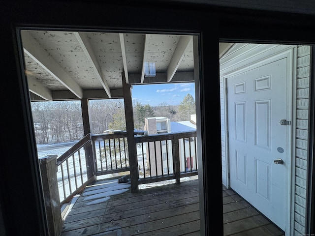 view of snow covered deck