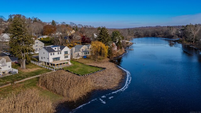 bird's eye view with a water view