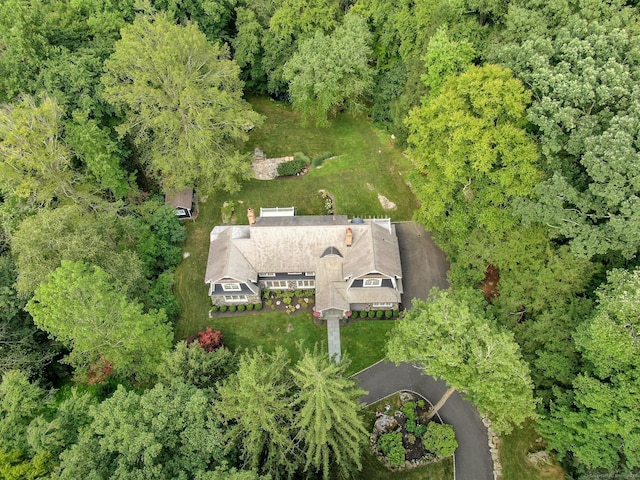 drone / aerial view with a view of trees