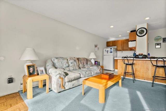 living room featuring light parquet flooring