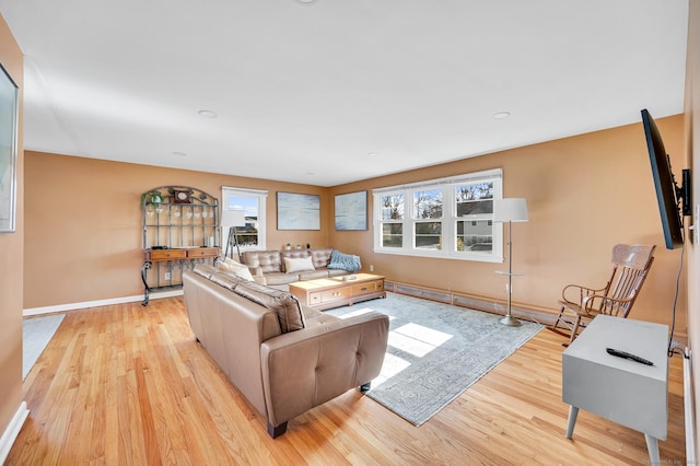 living room with light hardwood / wood-style floors