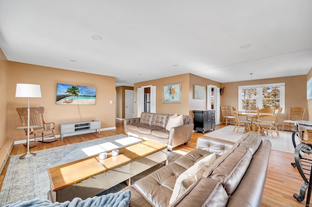 living room with light hardwood / wood-style floors