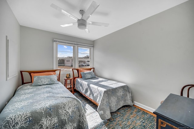 bedroom featuring hardwood / wood-style flooring and ceiling fan