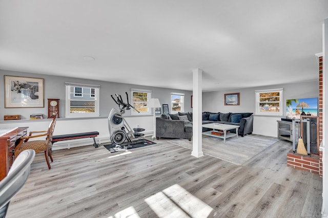 exercise area featuring light wood-type flooring