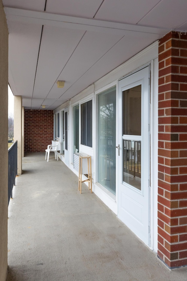 view of patio / terrace with a balcony