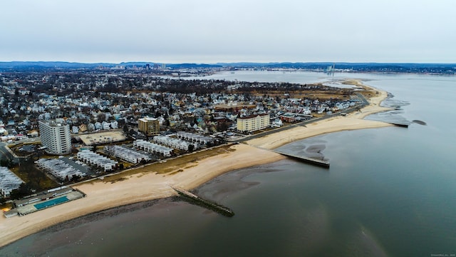 aerial view featuring a water view and a view of the beach