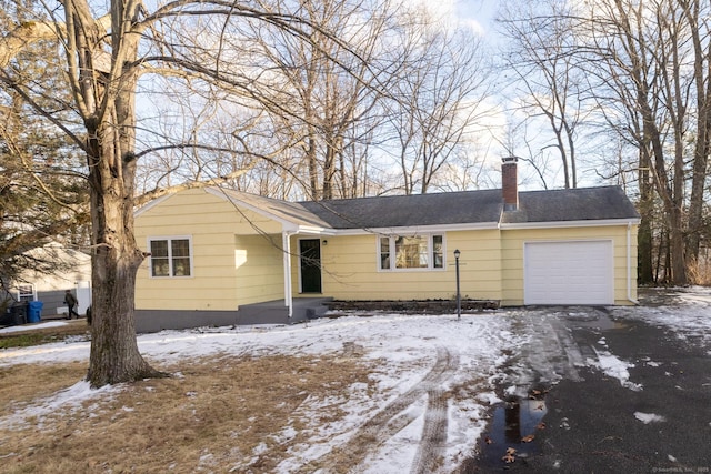 ranch-style house with a garage