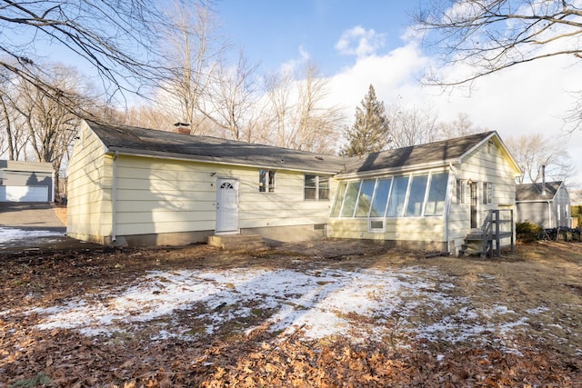 view of snow covered house