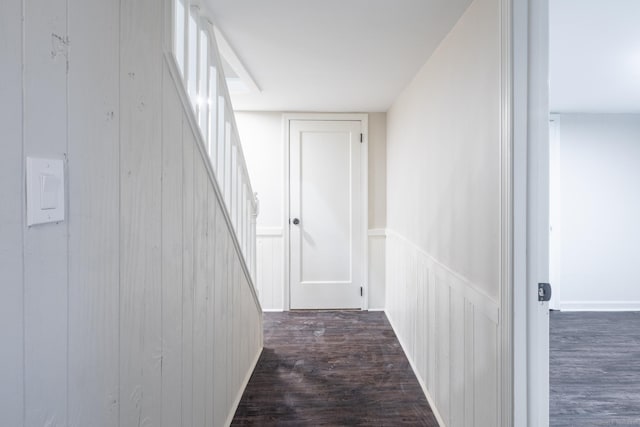 corridor featuring dark hardwood / wood-style floors