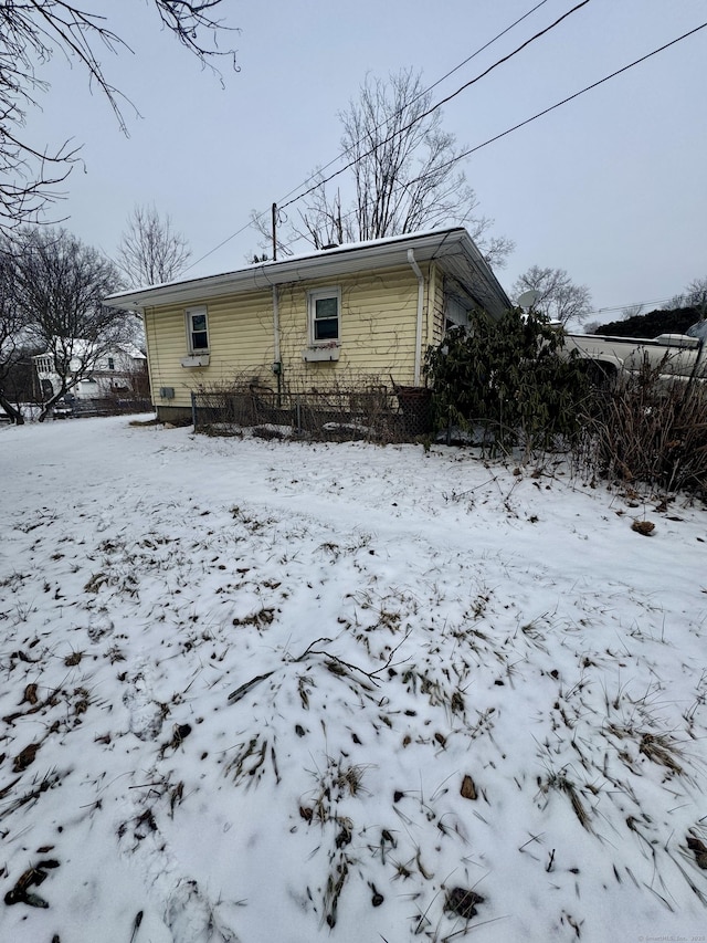 view of snow covered property