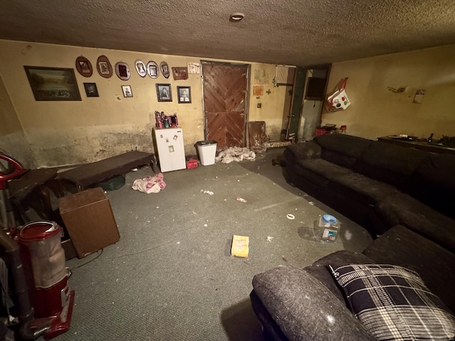 living room with a textured ceiling