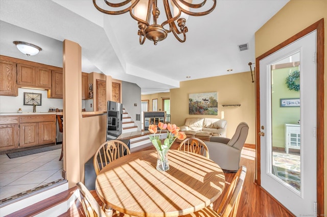 dining area featuring light tile patterned floors