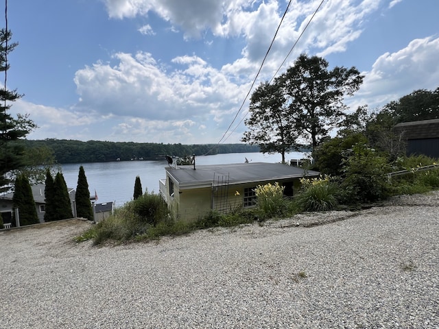 view of side of property with a water view