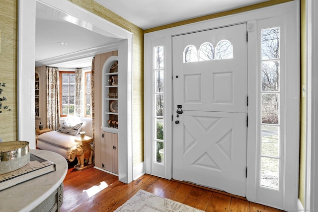 entrance foyer with a healthy amount of sunlight and light wood-type flooring