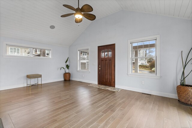 foyer entrance featuring wood ceiling, wood-type flooring, high vaulted ceiling, and ceiling fan